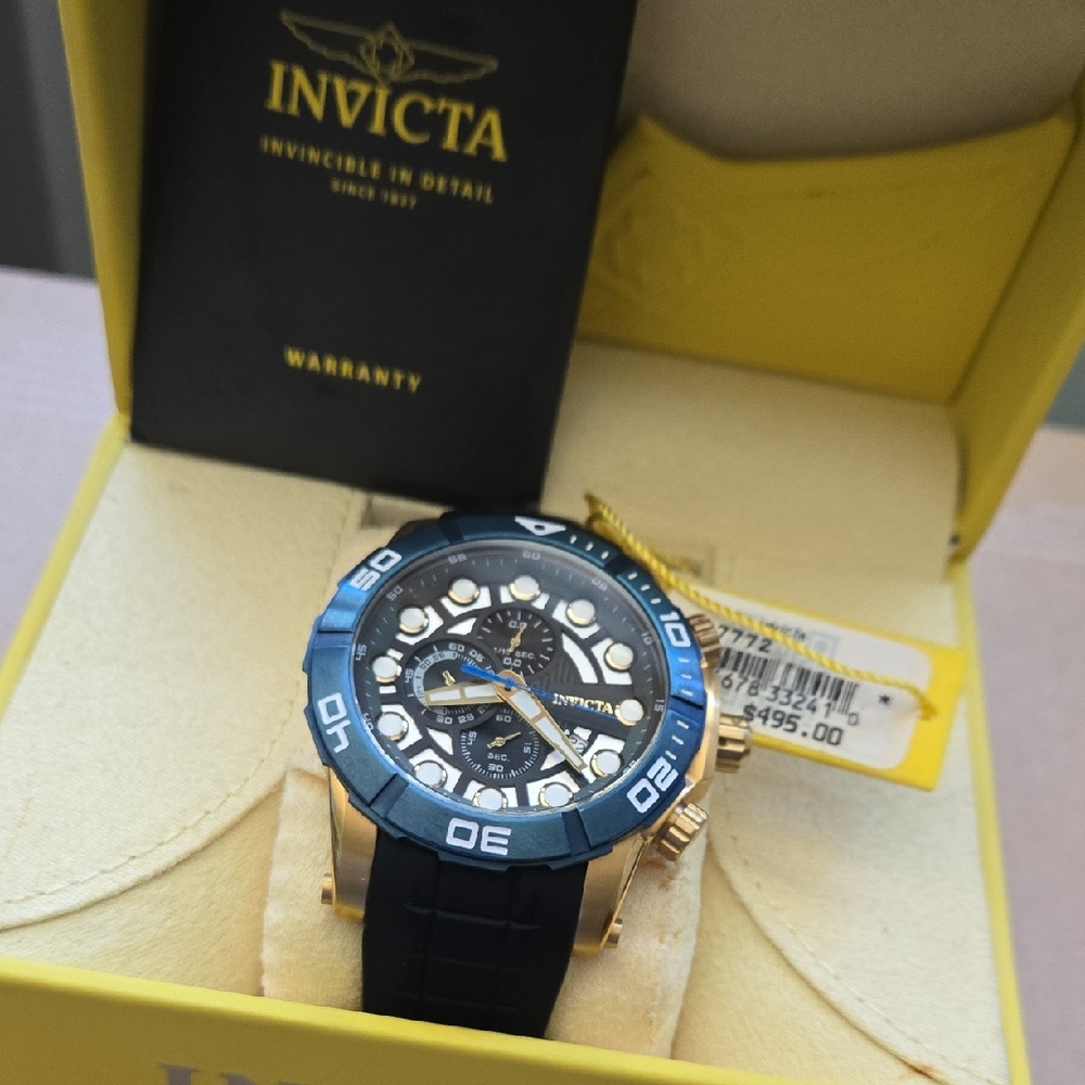 Invicta Gold and Blue Sea Hunter Watch